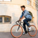 transitions: Cheerful young guy riding bicycle
