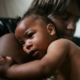 racial disparities in maternal and infant health report; Shanika Reaux holds her baby