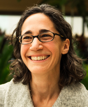 Sarah Bryer headshot; smiling woman with glasses
