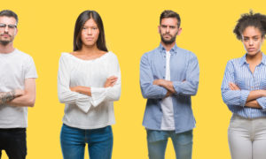 restorative justice: Collage of women and men over colorful yellow isolated background skeptic and disapproving expression on face with crossed arms.