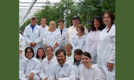 Maine agricultural education and youth garden grants; group of students and teachers in greenhouse garden