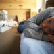 Homeless: Women Lying On Beds In Homeless Shelter