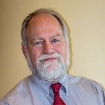 alt text: evidence: Larry Pasti (headshot), senior director, Forum for Youth Investment, gray-haired man with beard, mustache, wearing blue shirt, red patterned tie.