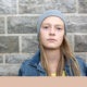 homelessness: Teenage girl with serious expression looking straight into the camera