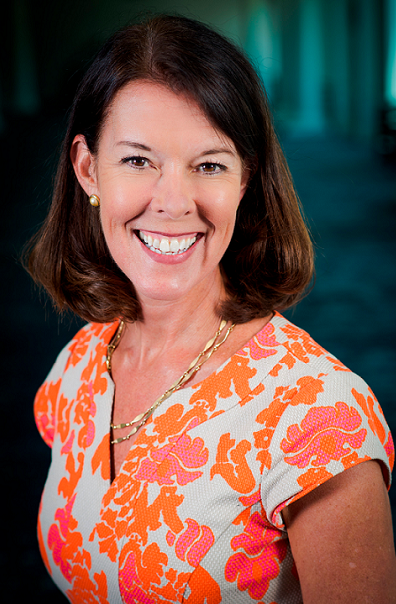 Suzanne McCormick newsmaker headshot; smiling woman w/ brown hair