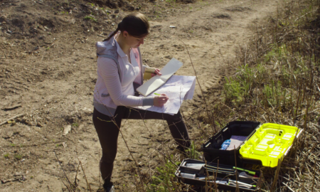 Arizona environmental job training grants; young woman working in nature