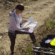 Arizona environmental job training grants; young woman working in nature