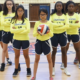youth afterschool sports program grants; girls' volleyball team on court