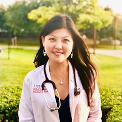 gun violence: Ning Zhao (headshot), co-course coordinator of Gun Violence and Physicians elective, smiling woman with long brown hair wearing medical school white coat, stethoscope around neck