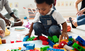 child care policy: young children playing at child care center