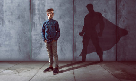 healing: Teenager with superhero shadow.