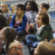 anti-bias and tolerance education grants; diverse kids sitting on classroom floor learning