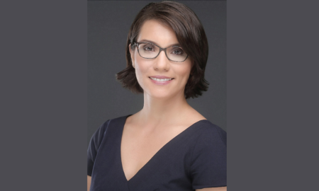 Dr. Carmen Rojas newsmaker; Latina woman in glasses headshot