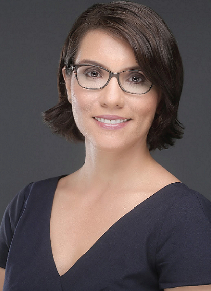 Carmen Rojas Newsmaker headshot; Latina woman in glasses