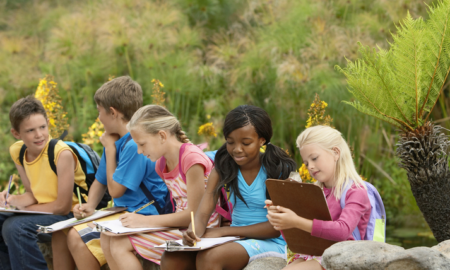 Environmental education grants; children taking notes in nature