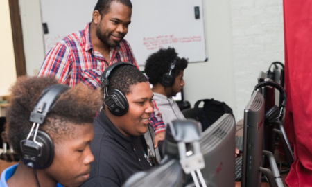 Innovative Community Organization Award Grants; black youth being taught on computers