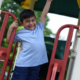 MN early childhood and youth development grants; young ethnic child on playground