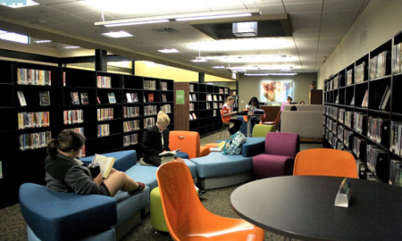 Texas rural library grants; rural library renovated with people reading