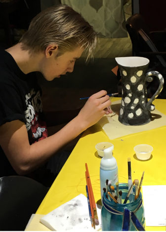 four-day school week: Boy paints pitcher