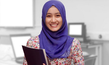 social and emotional learning project grants; young, happy student in hijab