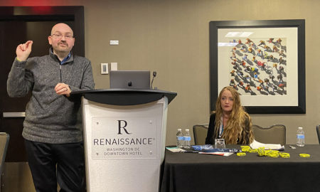 Chris Hultquist (at podium), executive director of The Mentor Connector, and Bobbi Jo Stellato, program director at The Mentor Connector, presenting at national mentoring conference. | Allison Stevens