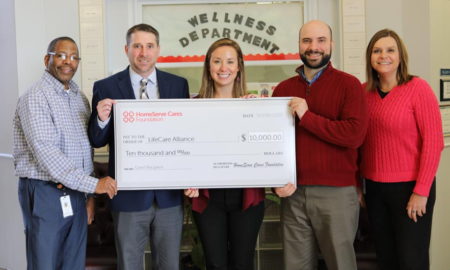 Community Public Spaces Improvement Project Grants; wellness center employees with grants check