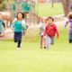 children and family health grants; young, happy children running in park