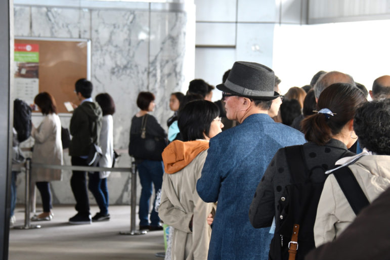  loans: people waiting on long line in lobby