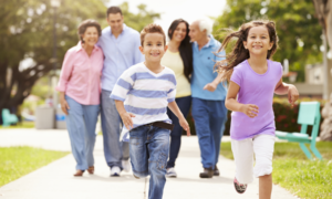 Parent, family and community grant, engagement national center grant; happy family walking in park