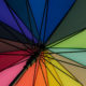 trans: Rainbow colors on umbrella.
