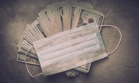 money: Medical face masks and money.