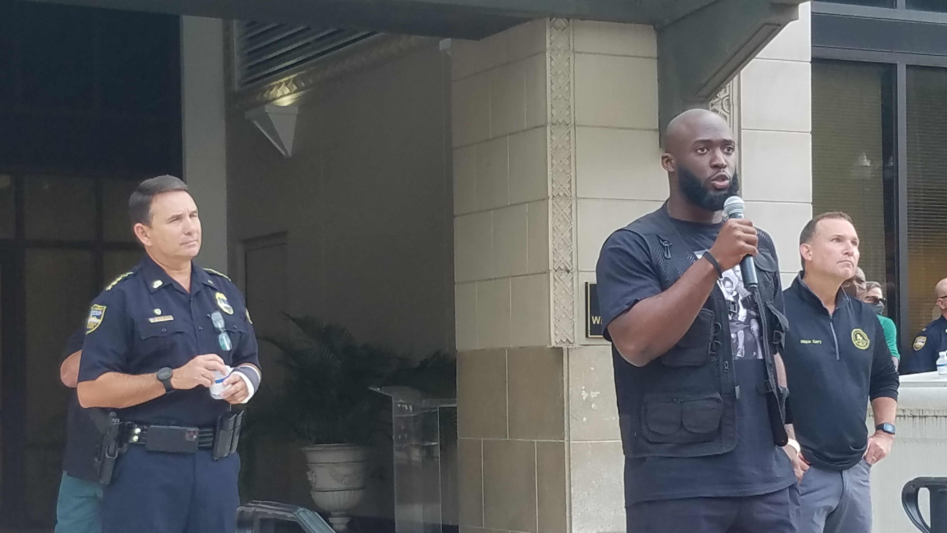 Black Lives Matter Protest Jacksonville: Jacksonville Jaguar Leonard Fournette flanked by Sheriff Mike Williams and Mayor Lenny Curry at June 9 rally in Downtown Jacksonville.