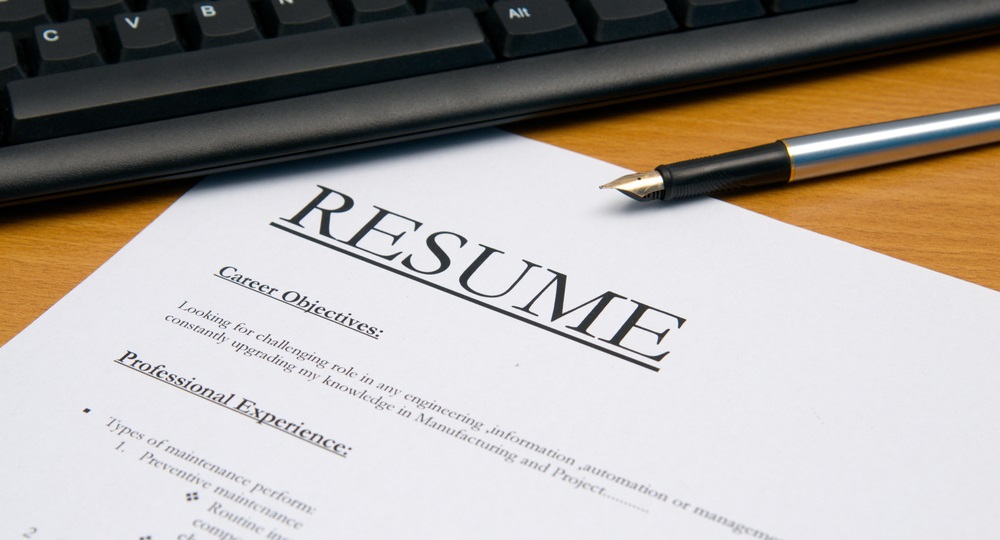 employment: image of resume for jobs application.