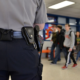 School Resource Officer report; armed security officer in school hallway