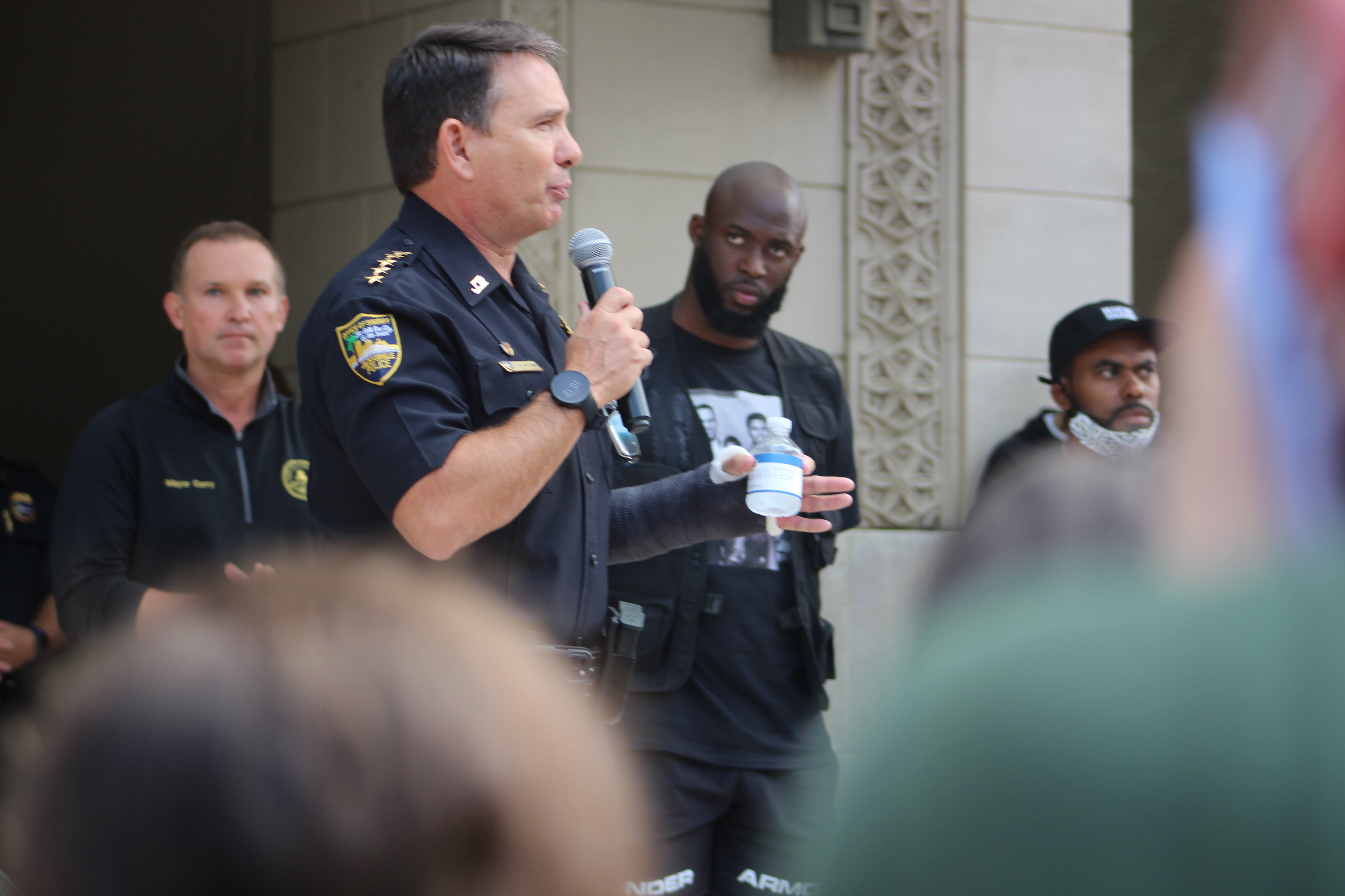 Black Lives Matter Protest Jacksonville: Sheriff Mike Williams flanked by Mayor Lenny Curry and Leonard Fournette at June 9 rally in Downtown Jacksonville