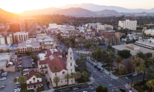 Inland Empire Latino community nonprofit support grants; Sunset aerial view of downtown Riverside, California.