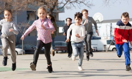 Kids outdoors running