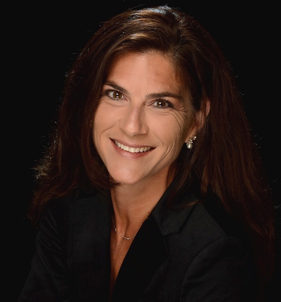 foster care: Rachel Sottile (headshot), president, CEO of Center for Children & Youth Justice, smiling woman with long brown hair, earrings, black top