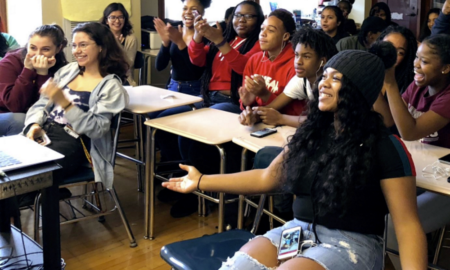 Stevens Initiative: Smiling female students in classroom applaud.