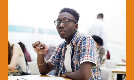 Mental health of Black LGBTQ youth report; photo of black, LGBTQ teen in classroom