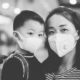 Asian American community nonprofit COVID support grants; Asian mother and child in facemasks shopping