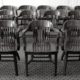 injustice in the lower courts report cover image; empty chairs at courthouse