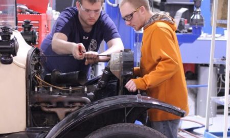 vehicle restoration/preservation youth education and training program grants; two young people working on antique car