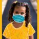 Childhood in the time of COVID report cover; young girl with stylized painted facemask and yellow shirt