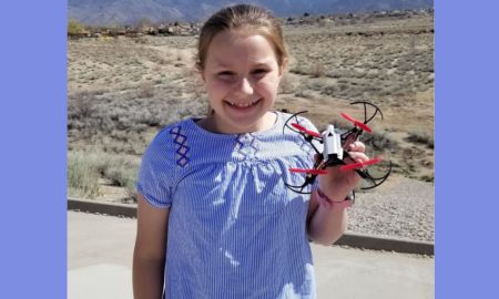 Georgia girls' STEM program; young girl holds her drone