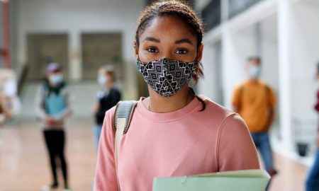 African-american student with face mask: