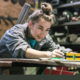 HS Apprenticeships:Young,Woman,Working,In,A,Workshop
