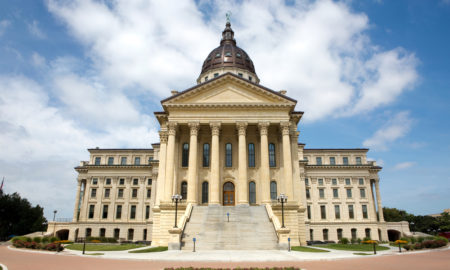 Adrian's Law: Kansas State Capitol builing traditional architecture cream-colored with dome centertop