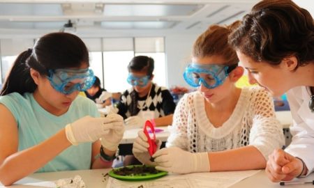 Community Health and Youth STEM education grants: group of students doing STEM lab in school