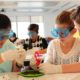 Community Health and Youth STEM education grants: group of students doing STEM lab in school